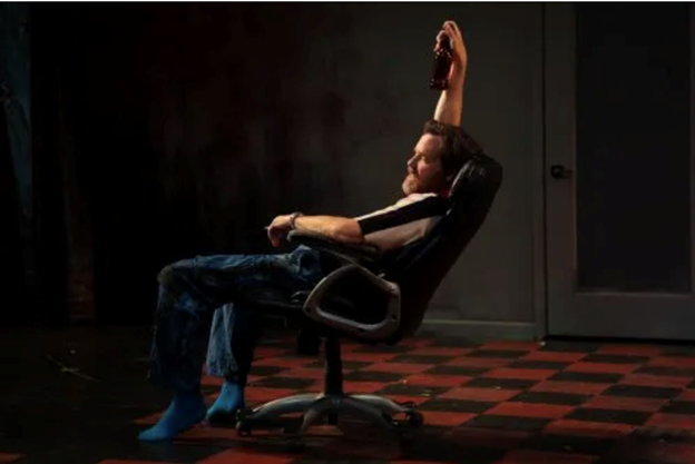 A person sitting in a chair

Description automatically generated with medium confidence