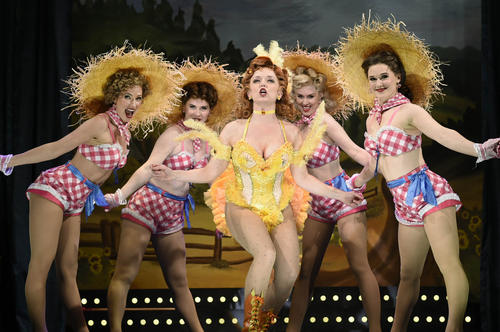 Miss Adelaide, played by Nancy Anderson (center) performs "A Bushell and a Peck" with the Hot Box Farmerettes.