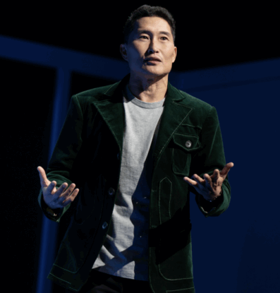 A person in a green jacket

Description automatically generated