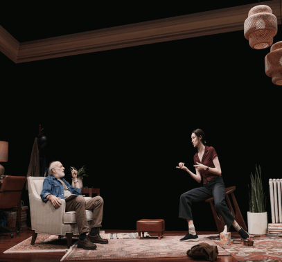 A person and person sitting in chairs

Description automatically generated