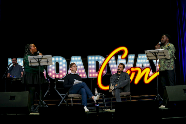 A group of people on stage Description automatically generated