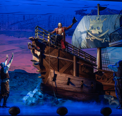 A scene from a musical play

Description automatically generated