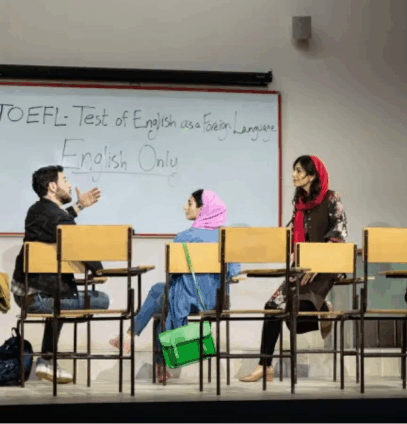 A group of people sitting in chairs in a classroom

Description automatically generated