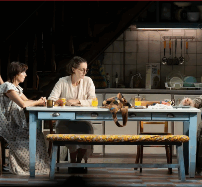 A group of people sitting at a table

Description automatically generated