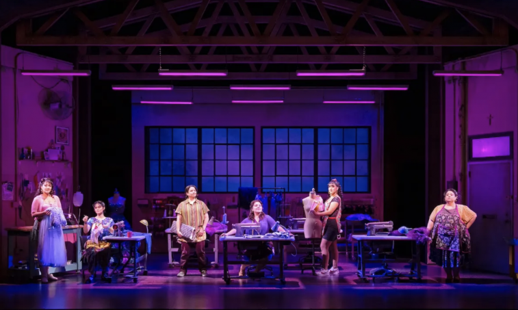 A group of people on a stage

Description automatically generated