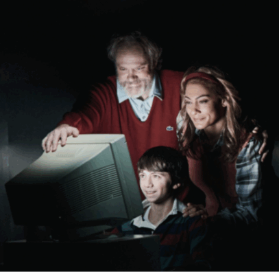 A person and person looking at a computer screen

Description automatically generated