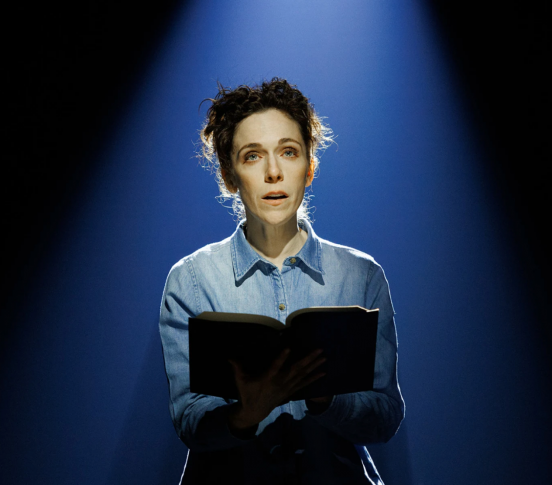 A person reading a book

Description automatically generated