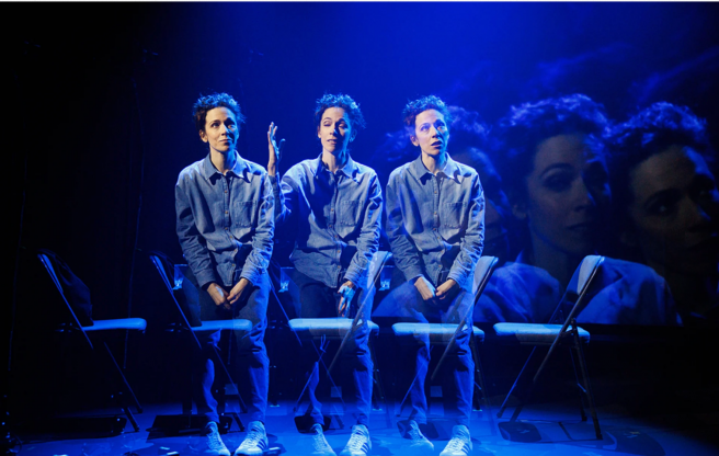 A group of people sitting on chairs

Description automatically generated