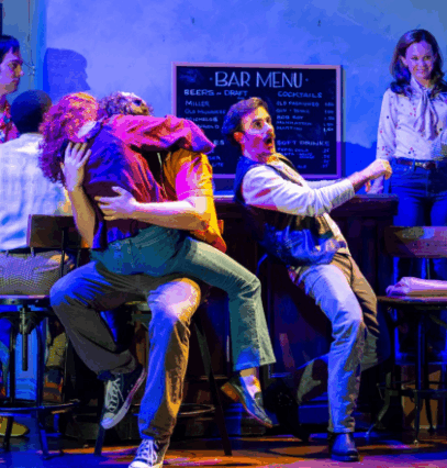 A group of people sitting on a chair

Description automatically generated