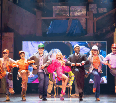 A group of people on a stage

Description automatically generated