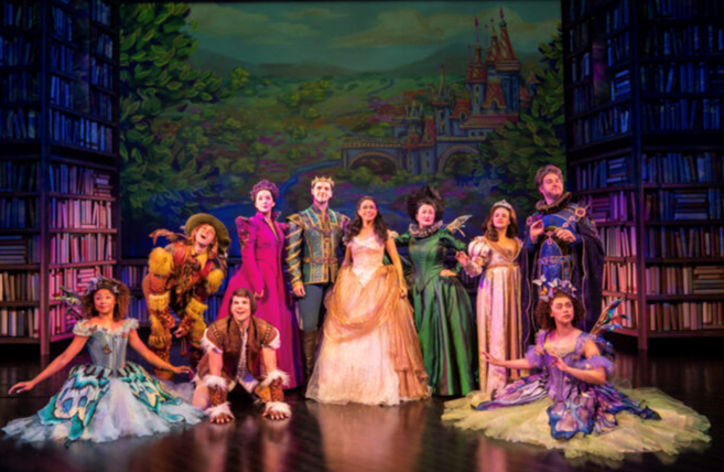 A group of people in clothing on a stage with medium confidence