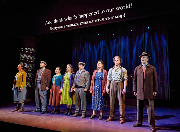 A group of people standing on a stage