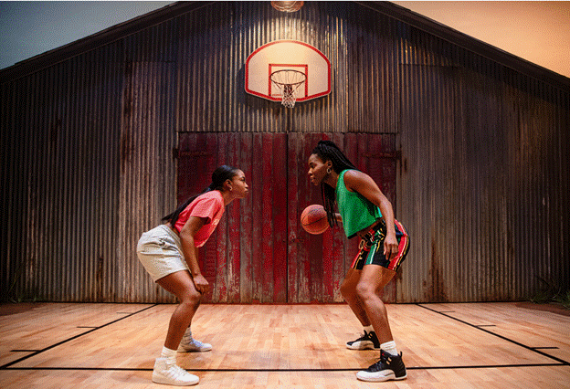 A person playing basketball in a room