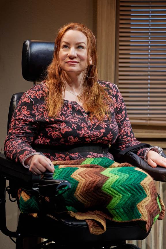 A person sitting in a chair with medium confidence