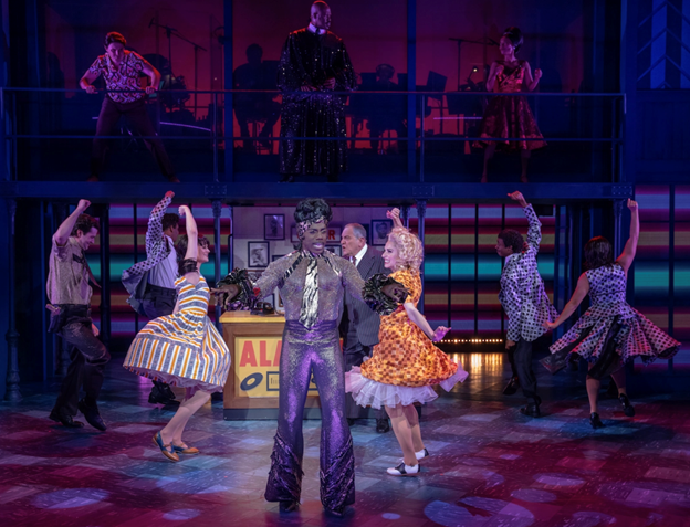 A group of people dancing on a stage