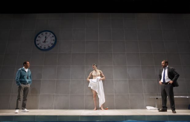 Peter Jay Fernandez, Alex Breaux, and Lucas Caleb Rooney star in Lucas Hnath's Red Speedo, directed by Lileana Blain-Cruz, at New York Theatre Workshop.