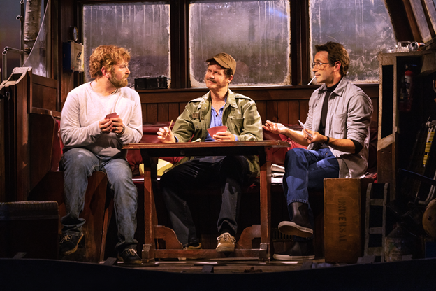 A group of men sitting at a table