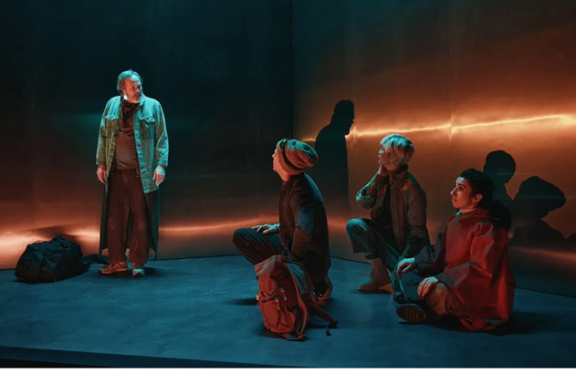 A group of people sitting on the floor