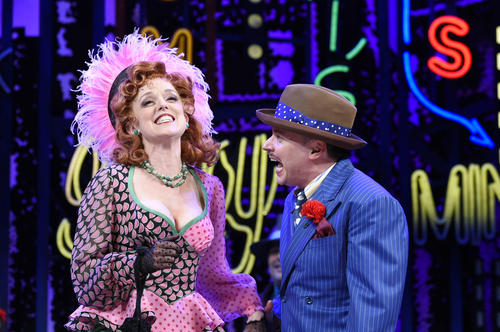 Miss Adelaide, played by Nancy Anderson, talks with her fiance, Nathan Detroit, played by Mark Price.