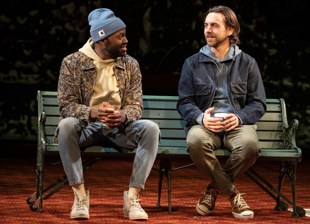 Two men sitting on a bench