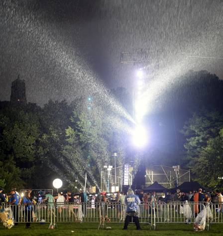 A picture containing outdoor, tree, crowd